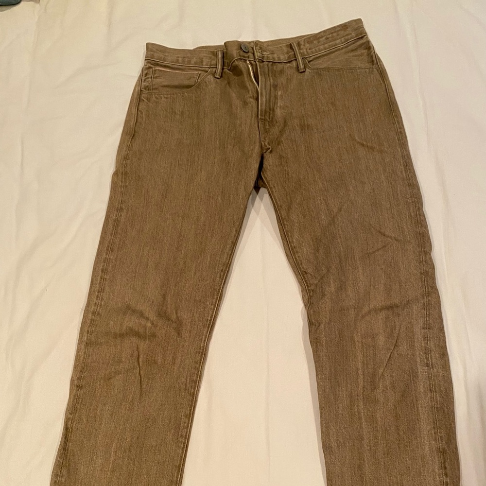 Kato Brand men’s slim cut jeans.